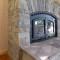 Custom indoor fireplace with 25 ft chimney