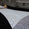 Yard makeover with antique effect chiselled interlock paving